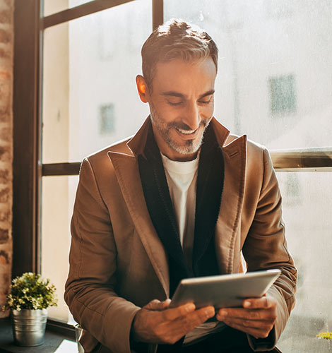 Businessman using tablet.